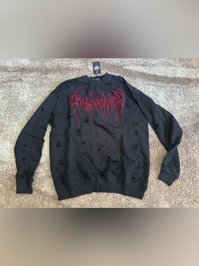 BREA THE DIVINITY CREWNECK